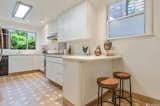 Before: The small kitchen was cut off from the rest of the home.  Photo 5 of 26 in A Pair of Filmmakers Give Their San Francisco Edwardian a Sensuous Edit
