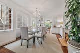 Before: Smaller openings from the dining room to the kitchen and family room made it feel more cordoned off.  Photo 8 of 26 in A Pair of Filmmakers Give Their San Francisco Edwardian a Sensuous Edit