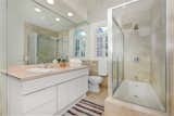 A look at the master bathroom, one of four in the home.