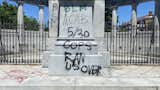 Spray paint on the Jefferson Davis monument in Richmond, Virginia.  Photo 4 of 7 in What Do Monuments Mean to Us?