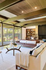 "The wood ceilings and beams, as well as the copper fireplace were not touched during the renovation—proof that, if you build correctly, it lasts," says Marc. The beam design was made famous by A. Quincy Jones, whom Avedisian studied under at USC. 