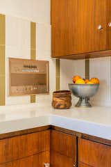 Built-in Nutone appliances and backsplash tile from Heath Ceramics are more period details.  Photo 5 of 16 in A Restored Post-and-Beam by a Richard Neutra Protégé Lists for $700K