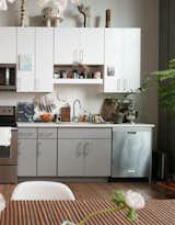 The ceramics on top of the kitchen cabinets are by Judith Salomon.