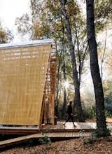 Gloria Montalvo’s weekend getaway on a reserve in central Chile is just 580 square feet, but the entire forest is its living room. Designed by architect Guillermo Acuña, it features a transparent facade over a skeletal pine frame.