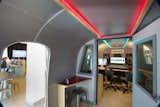 John Storyk imagined the inside as an inverse mirror of the outside of the Airstream. The interiors are finished with curved, perforated metal that improves acoustics.