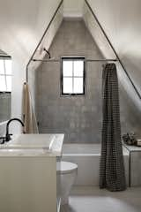 Hand-cut zellige tiles from&nbsp;Clé&nbsp;line the bathroom.