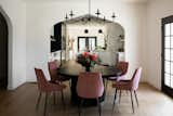 The dining area sits between the living area and the kitchen. French doors lead out to the side yard.&nbsp;