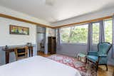 A look at the cottage's second bedroom. A built-in desk occupies a small nook in the corner.