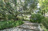 Numerous patios and pathways connect the compound.