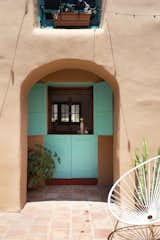 An original doorway is now a window to pass items through from the kitchen.&nbsp;