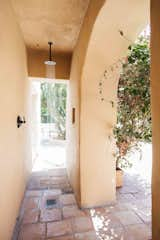 An outdoor shower fills one side of the patio.