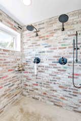 A closer look at the shower.  Photo 15 of 22 in An Arty Couple Say Goodbye to Their Handcrafted, Net-Zero Shipping Container House for $3.15M