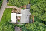 An aerial view of the property shows the home’s multiple outdoor spaces.