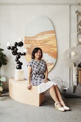 Rosie Li in her Brooklyn, New York, studio posing alongside her Bubbly Floor Lamp.  Photo 2 of 12 in The Dwell 24: Rosie Li