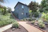 Back around front, the lower level of the detached garage doubles as a studio space.  Photo 18 of 24 in Asking $3.75M, This Bohemian Hillside Home in L.A. Comes Complete With a Potter’s Studio