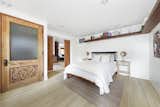 A look at the third bedroom downstairs.  Photo 13 of 24 in Asking $3.75M, This Bohemian Hillside Home in L.A. Comes Complete With a Potter’s Studio