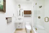 A full bathroom is located across the hall.  Photo 12 of 24 in Asking $3.75M, This Bohemian Hillside Home in L.A. Comes Complete With a Potter’s Studio