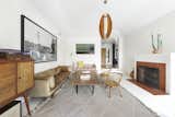 Inside, an entryway leads down into the sunlit living area. The interior renovation was led by Los Angeles–based designers <span style="font-family: Theinhardt, -apple-system, BlinkMacSystemFont, &quot;Segoe UI&quot;, Roboto, Oxygen-Sans, Ubuntu, Cantarell, &quot;Helvetica Neue&quot;, sans-serif;">Todd Nickey and Amy Kehoe of Nickey-Kehoe.</span>  Photo 2 of 24 in Asking $3.75M, This Bohemian Hillside Home in L.A. Comes Complete With a Potter’s Studio