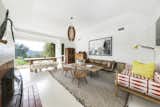 Another view of the living area reveals the large picture window at one end.  Photo 3 of 24 in Asking $3.75M, This Bohemian Hillside Home in L.A. Comes Complete With a Potter’s Studio
