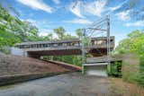 A Bridge-Like Home Suspended Above a Connecticut Hillside Asks $530K