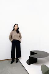Detroit–based designer Nina Cho with her Cantilever Coffee Table