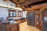 The kitchen cabinetry comes with carved details and custom hardware.  Photo 5 of 15 in Listed for $2.65M, This Bavarian-Style “Snow Haus” Near Lake Tahoe Is the Perfect Alpine Escape