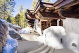 Walkways around the home connect several patios and outdoor areas.  Photo 13 of 15 in Listed for $2.65M, This Bavarian-Style “Snow Haus” Near Lake Tahoe Is the Perfect Alpine Escape