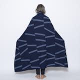 The Eco Broken Lines Throw is by Elodie Blanchard, another Saturday Green designer.