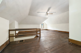 A look at the sunlit attic space, which features newly refinished hardwood floors.