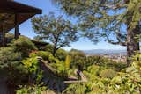 Around back, an additional staircase connects to paths that wind through the property’s garden. Views from the hilltop lot include Sather Tower, a landmark on the UC Berkeley campus, as well as&nbsp;Mount Tamalpais&nbsp;in the distance.
