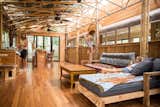 These Legendary Surfers’ Converted School Bus Connects to a Three-Story Tree House on Hawaii - Photo 3 of 10 - 