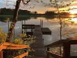 The property also leads down to a waterfront dock along <span style="font-family: Theinhardt, -apple-system, BlinkMacSystemFont, &quot;Segoe UI&quot;, Roboto, Oxygen-Sans, Ubuntu, Cantarell, &quot;Helvetica Neue&quot;, sans-serif;">Gordon’s Creek, a brackish waterway that connects to the larger James River. While the home is sited on a waterfront lot, the property is not within the FEMA 100-year floodplain and thus, flood insurance is not mandatory.</span>  Photo 12 of 12 in Surrounded by a Marshy Forest, This Fortress-Like Home Asks $1.7M in Virginia