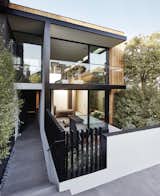 This contemporary home designed by MAK Studio is now up for sale in San Francisco's Dolores Heights neighborhood. A gated parking pad in front of the structure is bordered by a walkway from the street, which leads down past a sunken patio and living wall to the main entrance.  Photo 1 of 19 in This Radiant San Francisco Residence Hits the Market at $6.8M