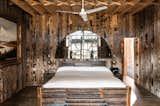 The bedroom walls are clad in reclaimed timber.  Photo 7 of 15 in This Live/Work Warehouse That Starred in Steven Spielberg’s “Ready Player One” Lists for £2.75M