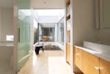 As in traditional Japanese homes, L House has a single bathroom with a large bathtub and separate wash area.
