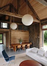 The airy, light-filled interior is made of reclaimed timber and siding from a 19th-century barn.