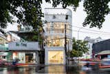 Exterior, Flat RoofLine, and Glass Siding Material  Photo 5 of 23 in A Translucent Tower in Vietnam Invites Visitors in for a Cup of Coffee