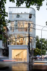 Exterior, Glass Siding Material, and Flat RoofLine  Photos from A Translucent Tower in Vietnam Invites Visitors in for a Cup of Coffee