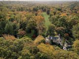 Although the home is extremely secluded, it is conveniently located near the center of New Canaan and is just an hour away from New York City.  Photo 11 of 11 in Paul Simon’s Grand Connecticut Estate Returns to the Market—This Time Asking $11.9M