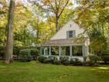 The sale includes a 2,400-square-foot cottage, which even comes with its own garage. This structure space can easily be converted into a guest house, or a creative studio.  Photo 10 of 11 in Paul Simon’s Grand Connecticut Estate Returns to the Market—This Time Asking $11.9M