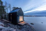 The prefabricated Majamaja Cabin by Littow Architectes is the first of five built for the Majamaja Village, an off-grid eco-retreat near Helsinki, Finland. The two-level, minimalist cabin was constructed on-site from prefab wood panels and without the use of heavy machinery.&nbsp;
