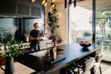 Olsen enjoys a cup of coffee made by the La Specialista machine. “It’s the perfect fit in a kitchen that is personalized for our own style and life,” he comments.  Photo 6 of 7 in An Architect’s Dream Kitchen Channels SoCal’s Laid-Back Vibes With a Fusion of Homey Materials
