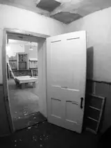 One of the school's two entry original vestibules (pictured) is now a foyer; the other is a small reading room.