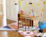 A modular rug by Kinder MODERN adds zest to a petite activity area.