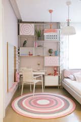 Hay’s Blush Room was designed for a 12-year-old girl and offers studying, sleeping, and playing areas. Different materials and textures—wood, metal, wool, fabric—add variety while feeling polished.