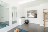 Adjacent to the music studio is the yoga room, which can also be converted into a home gym.