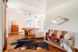 Fitted with retro furnishings, the game room is another space that opens to the backyard.