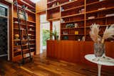 "The room for books, aka the library, has its own skylight, a classic library ladder, and ample storage space," notes Bestor. "It’s also a nice transition from public to private space for work and reflection."
