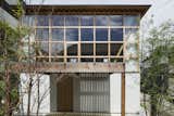 Module Grid House by Tetsuo Yamaji Architects is a two-story, flat-roofed residence in Saitama, Japan, that uses shakkanho, a traditional measurement system based on grids of tatami mats—each grid measures 30-by-30-feet.