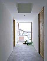 In the extension, a hallway leads to the bedroom and bathroom.